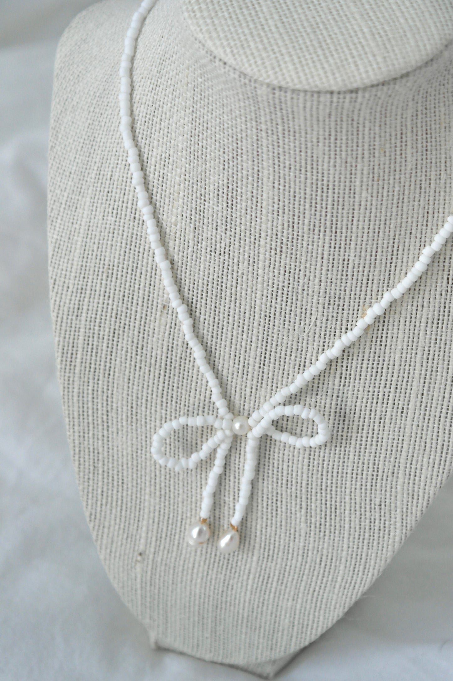 PEARL BOW NECKLACE